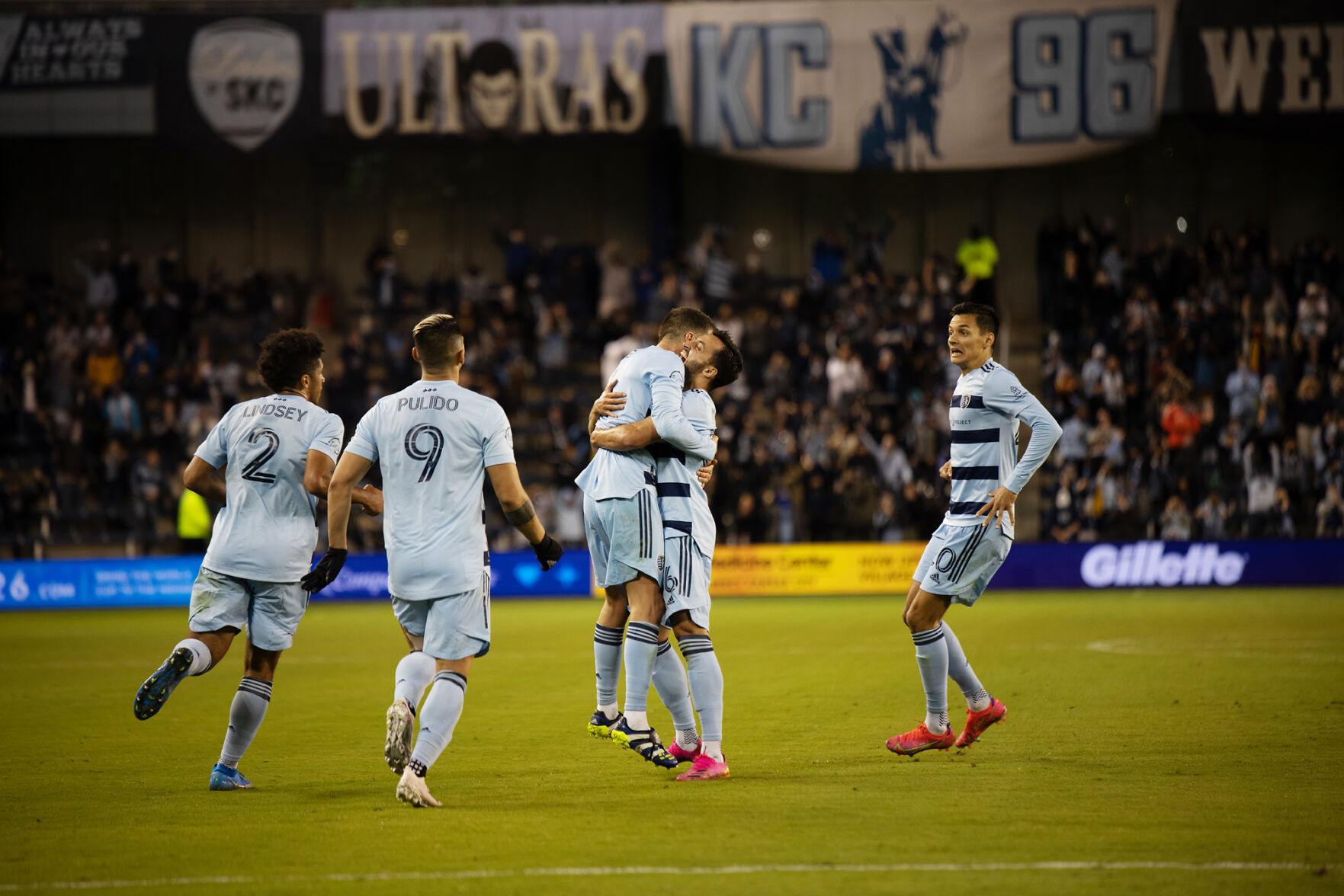 Ilie Sanchez and Luis Martins hug after a goal